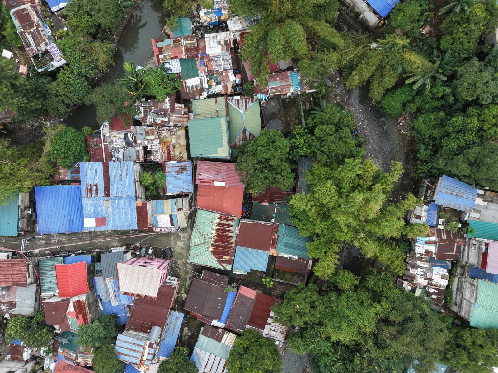 Selected drone photograph — Caloocan drone capture · AD-54F69002